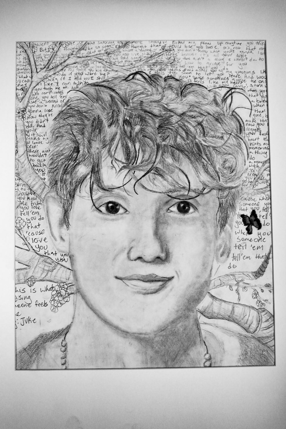 Pencil drawing of boy with curly hair Pencil drawing of boy with curly hair