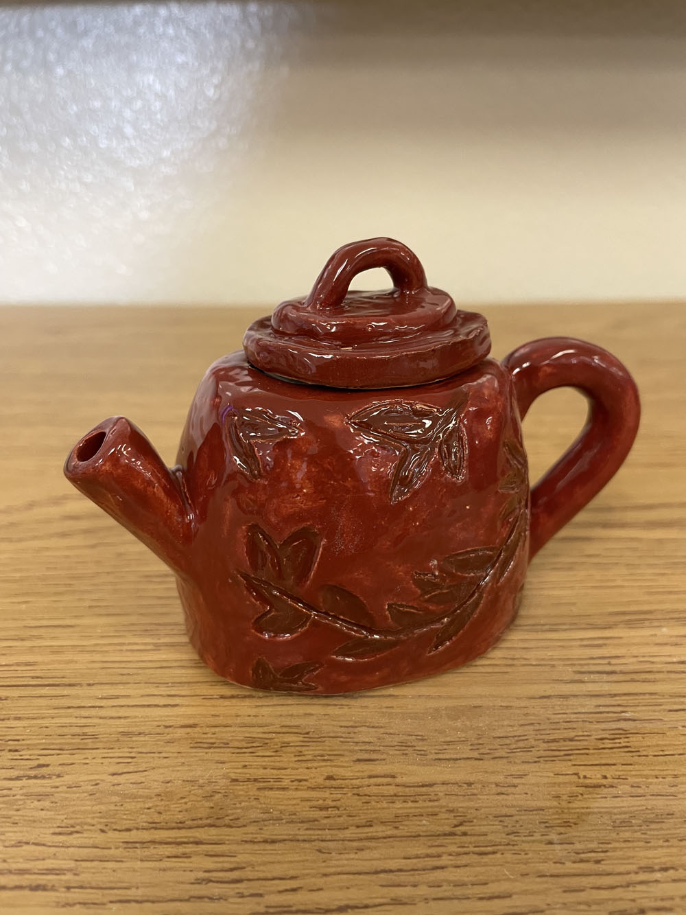 Clay tea pot with leaves Clay tea pot with leaves