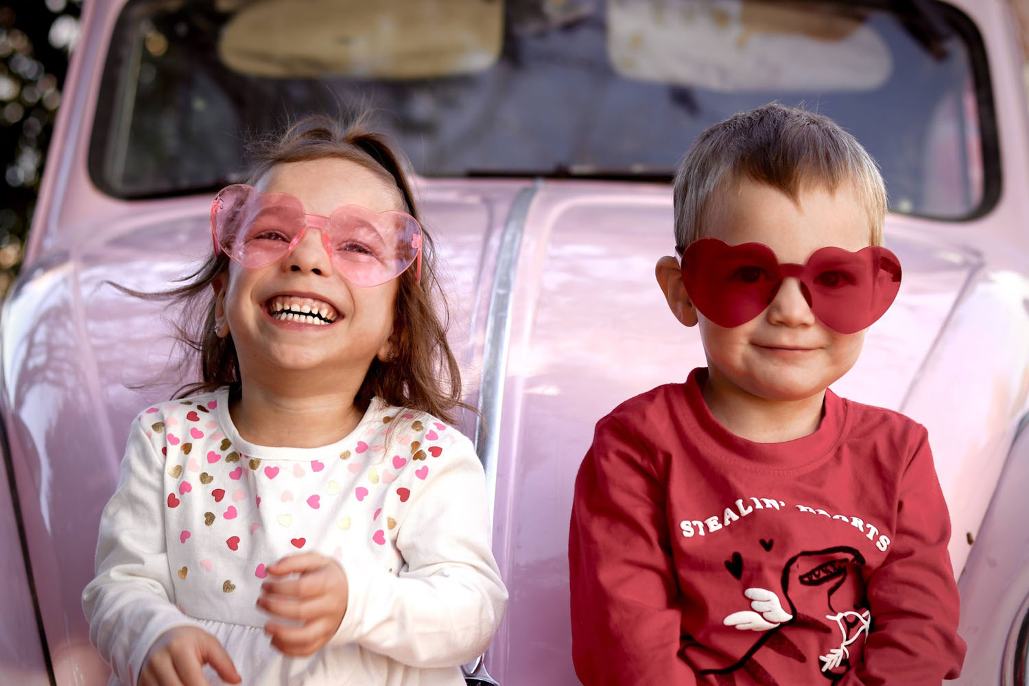 Two kids with sunglasses smiling Two kids with sunglasses smiling
